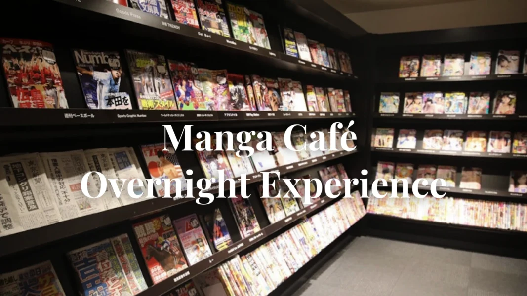 Private booth in a Japanese manga café with bookshelves and computer