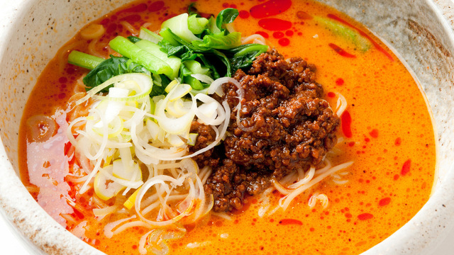 Japanese tantanmen—fiery sesame‑chili broth with minced pork, Sichuan pepper kick and bok choy
