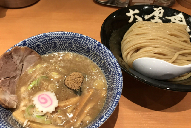 Tsukemen dip‑style ramen—thick chilled noodles served with hot, concentrated pork‑fish dipping broth